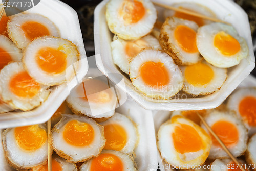 Image of Scrambled quail eggs at the eastern market close-up