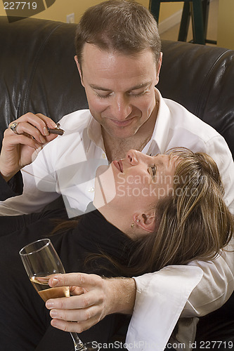 Image of couple relaxing on couch