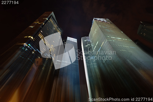 Image of Night skyscrapers stretching into the sky