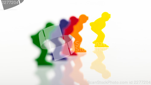 Image of Five colored pawns isolated on a white background