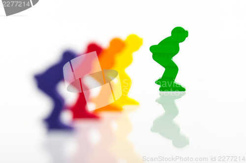 Image of Five colored pawns isolated on a white background