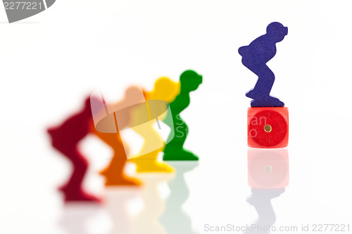 Image of Five colored pawns isolated on a white background