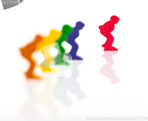 Image of Five colored pawns isolated on a white background