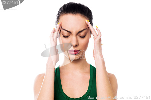 Image of Asian woman having headache