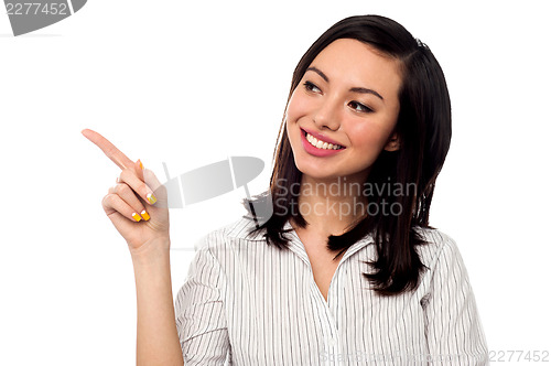 Image of Business entrepreneur pointing away