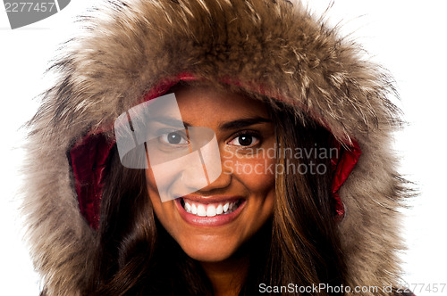 Image of Pretty African girl in fur hood