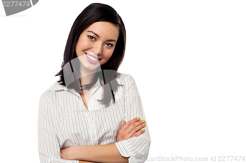Image of Female secretary posing with arms crossed