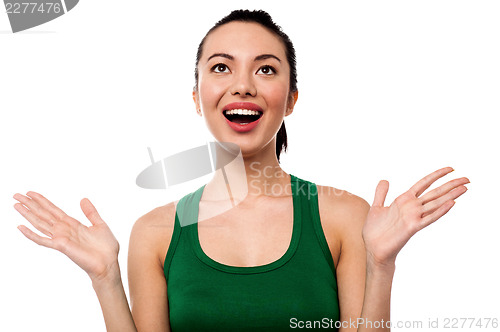 Image of Cute girl laughing heartily with open hands