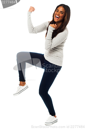 Image of Young girl rejoicing in excitement