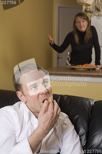 Image of couple arguing in apartment