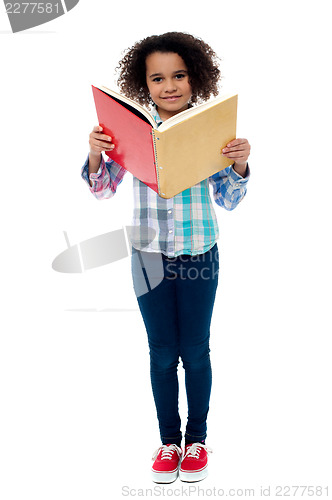 Image of School girl a reading book