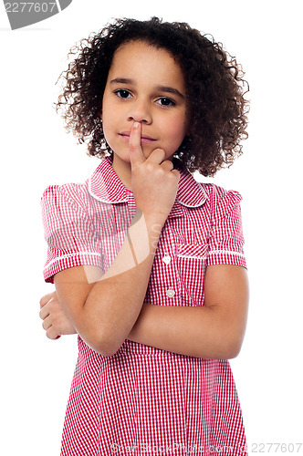 Image of Pretty african american gesturing silence