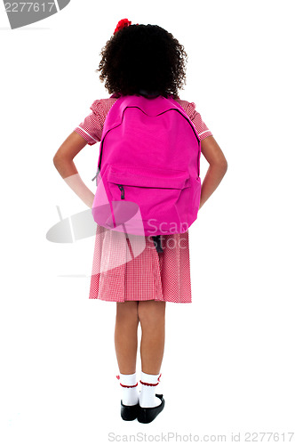 Image of Primary school girl facing wall
