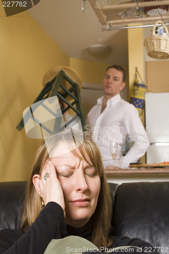 Image of couple arguing in apartment