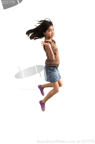 Image of teen jumping high