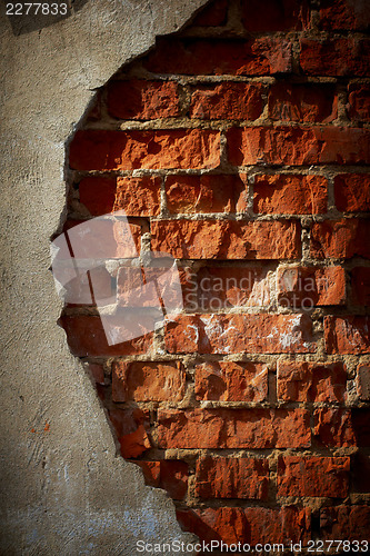 Image of Old grunge brick wall with space for text. Vertical orientation.