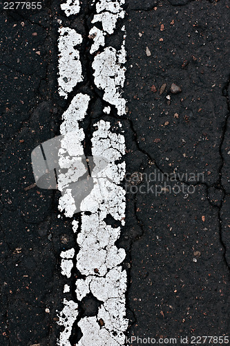 Image of Asphalt road line closeup. 