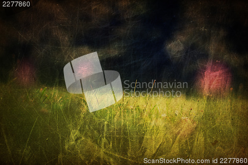 Image of Defocused clover flowers on meadow. Vintage styled shot