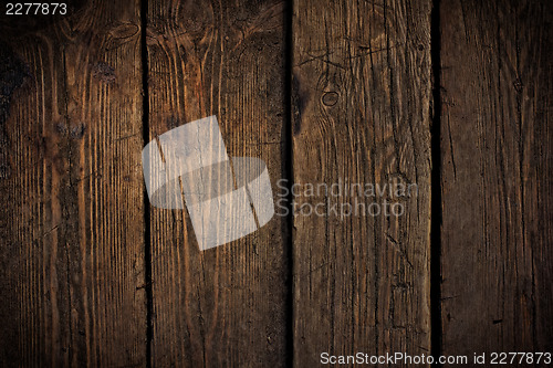 Image of Old scratched wooden texture. May use for grunge styled design w