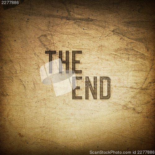 Image of Old cinema phrase (The End...), grunge background