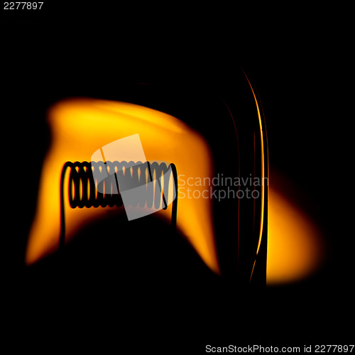 Image of Glower of halogen lightbulb. With stylish effect of optical aber