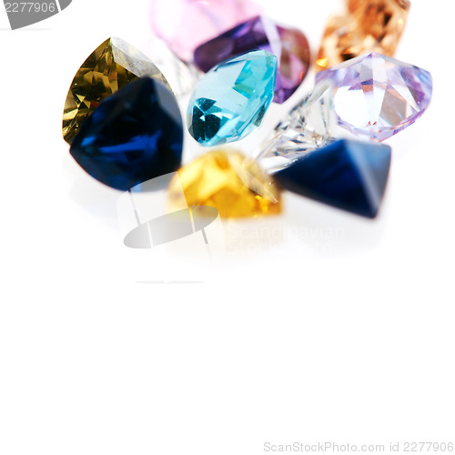 Image of Collection of gemstones against white background