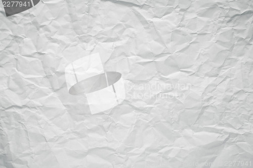Image of Crumpled white office paper texture.