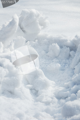 Image of Snow drifts removal,  background, closeup.