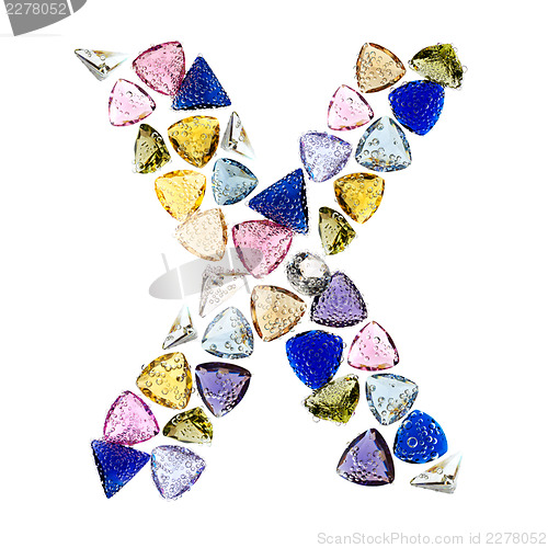 Image of Gemstones alphabet, letter X. Isolated on white background.