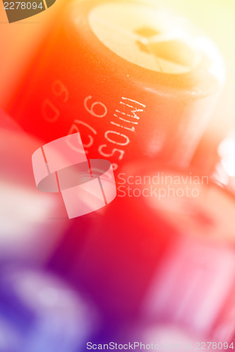 Image of Colored electronic components (capasitors), shallow depth of fie