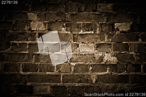 Image of Rough brick wall, toned.