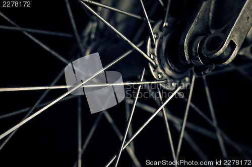 Image of Bicycle wheel, closeup shot. Toned
