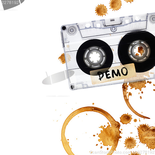 Image of Vintage demo tape with coffee stains. 