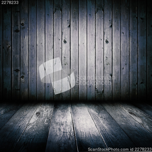 Image of Interior of an old wooden shed, illuminated by the full moon.