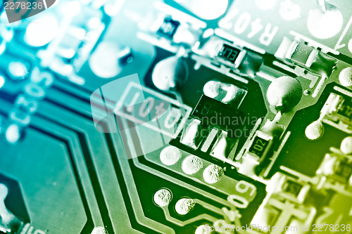 Image of Electronic circuit board. Macro shot, toned.