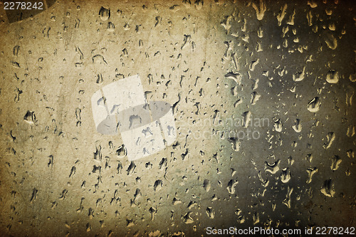 Image of Vintage glass with raindrops