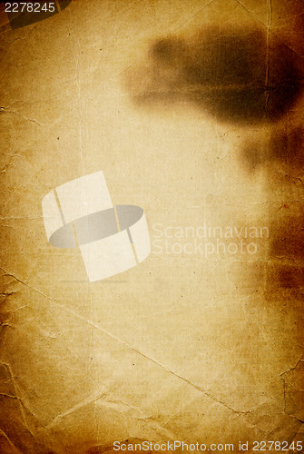 Image of Old burned paper. Classic vintage background.