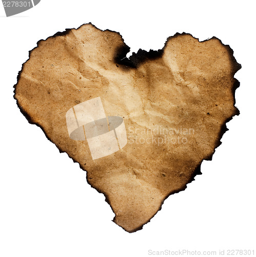 Image of Burned heart-shaped paper isolated on white.