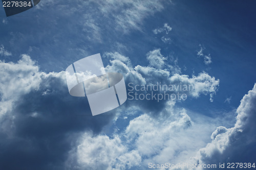 Image of Blue worried sky with clouds