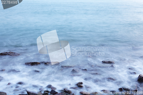 Image of Long exposure of beach at evening