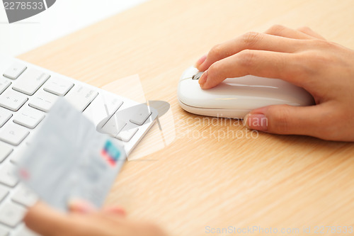 Image of Online shopping with credit card and keyboard