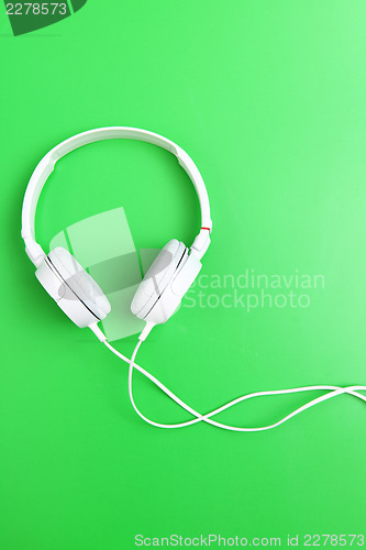 Image of Headphone on green background