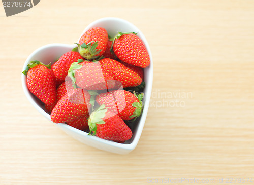 Image of Strawberry in heart shape bowl