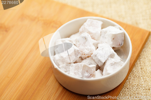 Image of Turkish candy on wooden board