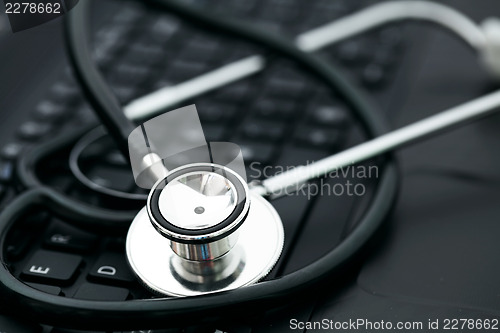 Image of Stethoscope on computer keyboard