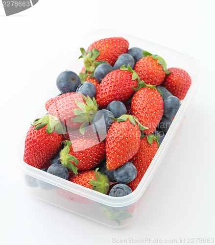 Image of Strawberry and blueberry mix in plastic container