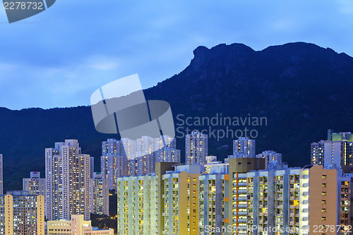 Image of Hong Kong cityscape with lion rock at night