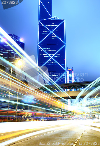 Image of City at night with busy traffic