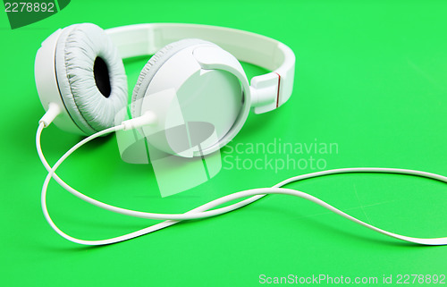 Image of Headphone on green background