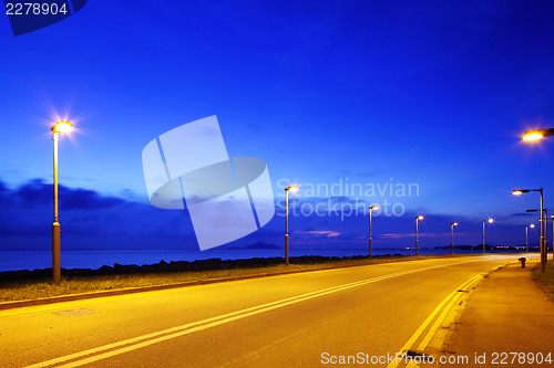 Image of Empty asphalt road at night